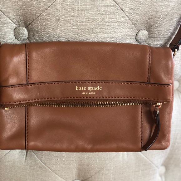 kate spade Handbags - KATE SPADE Tan foldover crossbody bag., strap is 22 inches. Dust bag included.